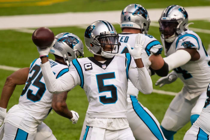 Carolina Panthers quarterback Teddy Bridgewater (5) warms up before the game against the Minnesota Vikings at U.S. Bank Stadium.